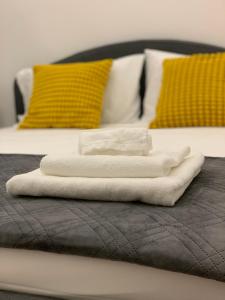 Postel nebo postele na pokoji v ubytování Citywise Vittorio - Independent Apartment near Bari central station