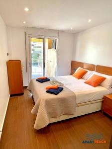 Кровать или кровати в номере APARTBEACH EUROPEOS JUNTO PLAYA CLIMATIZADO CON GRAN TERRAZA y MUY LUMINOSO