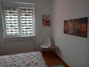 Ένα ή περισσότερα κρεβάτια σε δωμάτιο στο Apartman Marija