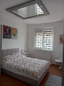 Ένα ή περισσότερα κρεβάτια σε δωμάτιο στο Apartman Marija