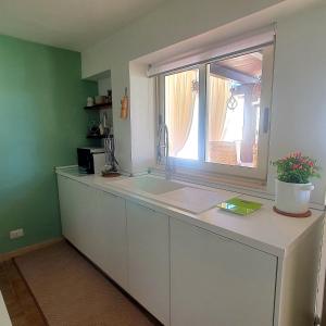 Kuchyň nebo kuchyňský kout v ubytování Agave Villa's Fronte Mare + 15 fotografií