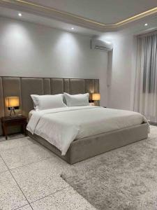 Säng eller sängar i ett rum på Luxury apartment