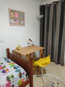 Voodi või voodid majutusasutuse Moderne appartement toas