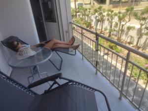 A balcony or terrace at Bee life apts, Sweet house