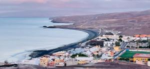 an aerial view of a town next to the ocean at La Palma in Tarajalejo