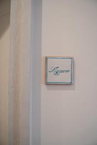 Certifikát, hodnocení, plakát nebo jiný dokument vystavený v ubytování B-Welcome Rooms of Charme e Relax