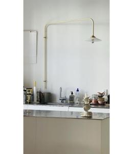 a kitchen with a white counter and a sink at ApartmentInCopenhagen Apartment 1543 in Copenhagen