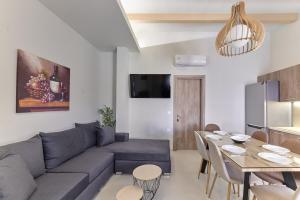 A seating area at 2 bedroom Villa with heated swimming pool-Spa whirlpool-BBQ!