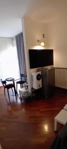 TV a/nebo společenská místnost v ubytování SUITE184