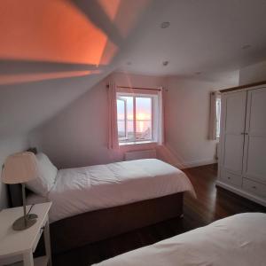 Voodi või voodid majutusasutuse An Creagán Rooms toas