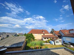 a view from the roof of a house at Appartement 48m², Strasbourg centre à 15 min en train in Fegersheim