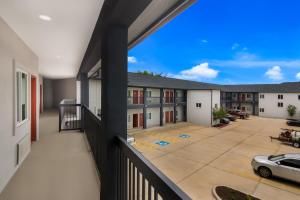 a view from the balcony of a apartment building at Scottish Inns- Forest Hill in Forest Hill