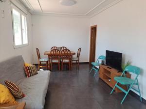 Posezení v ubytování Ático con terraza