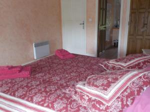 Cama o camas de una habitación en Le Mas des Busclats