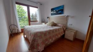 Postel nebo postele na pokoji v ubytování CHECK IN CASAS Pirita