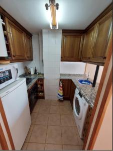 Kuchyň nebo kuchyňský kout v ubytování CHECK IN CASAS Pirita + 9 fotografií