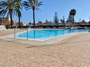 The swimming pool at or close to Casita blanca near yumbo
