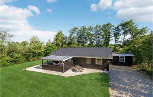 a small house with a solarium in a yard at 3 Bedroom Beautiful Home In Toftlund in Toftlund +15 photos