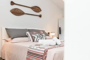 Postel nebo postele na pokoji v ubytování Portofino's Little Nest con Parcheggio Wi-Fi e aria condizionata
