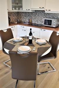 Kuchyň nebo kuchyňský kout v ubytování Apartment d ´Freizeit