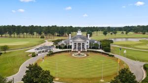 an aerial view of a house on a golf course at Golfer's Delight at World Tour Golf in Myrtle Beach