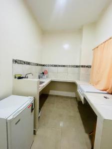 Kuchyň nebo kuchyňský kout v ubytování Casa de Huéspedes Playas Arena
