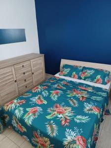 Postel nebo postele na pokoji v ubytování Mancenillier