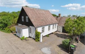 an aerial view of a black and white house at Amazing Home In stermarie With 3 Bedrooms And Wifi in Østermarie