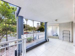 an open balcony with a view of the street at Spacious Newly Furnished 2bed Apartment in South Brisbane in Brisbane