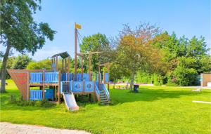 a playground in a park with a slide at Beautiful Home In Heinkenszand With Wifi in Heinkensand