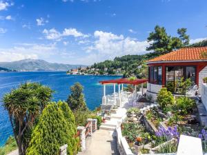 a house with a view of a body of water at Vila Tea in Korčula