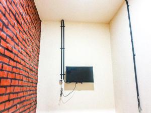 TV a/nebo společenská místnost v ubytování Swahouse Kost Pria Wanita