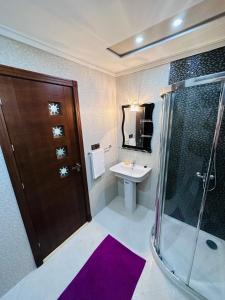 Baðherbergi á Abraj Dubai Larache