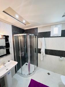 Baðherbergi á Abraj Dubai Larache