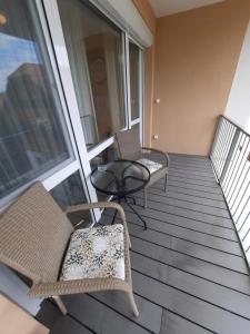 A balcony or terrace at Gizella Apartman
