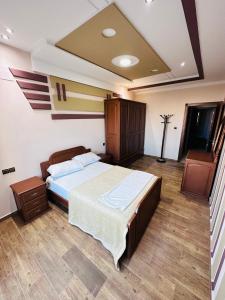 Letto o letti in una camera di Abraj Dubai Larache
