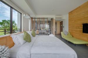 Voodi või voodid majutusasutuse Jiaoxi 320 B&B toas