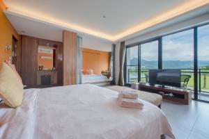 Voodi või voodid majutusasutuse Jiaoxi 320 B&B toas