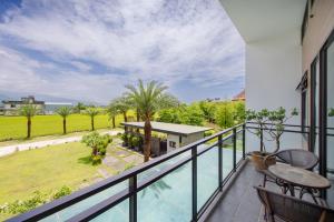 Rõdu või terrass majutusasutuses Jiaoxi 320 B&B