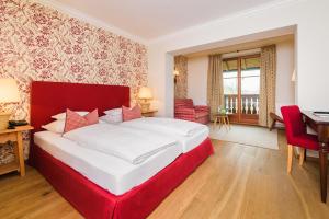 Łóżko lub łóżka w pokoju w obiekcie Hotel Gasthof Brandstätter