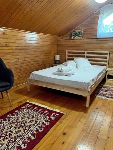 Un pat sau paturi într-o cameră la Morena Mansion