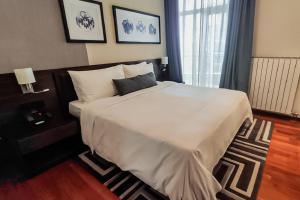 Letto o letti in una camera di Bosmal Arjaan by Rotana