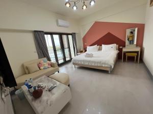 Katil atau katil-katil dalam bilik di Dongjin Bay B&B
