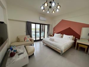 Katil atau katil-katil dalam bilik di Dongjin Bay B&B