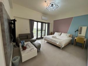 Katil atau katil-katil dalam bilik di Dongjin Bay B&B