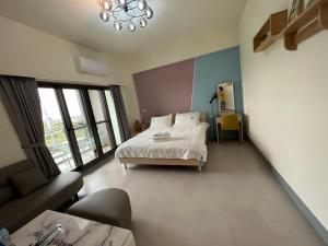 Katil atau katil-katil dalam bilik di Dongjin Bay B&B