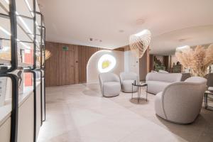 Posezení v ubytování Hotel Astor