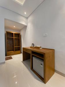 Kuchyň nebo kuchyňský kout v ubytování Kope House Ubud