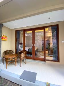 Posezení v ubytování Kope House Ubud