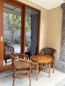 Posezení v ubytování Kope House Ubud